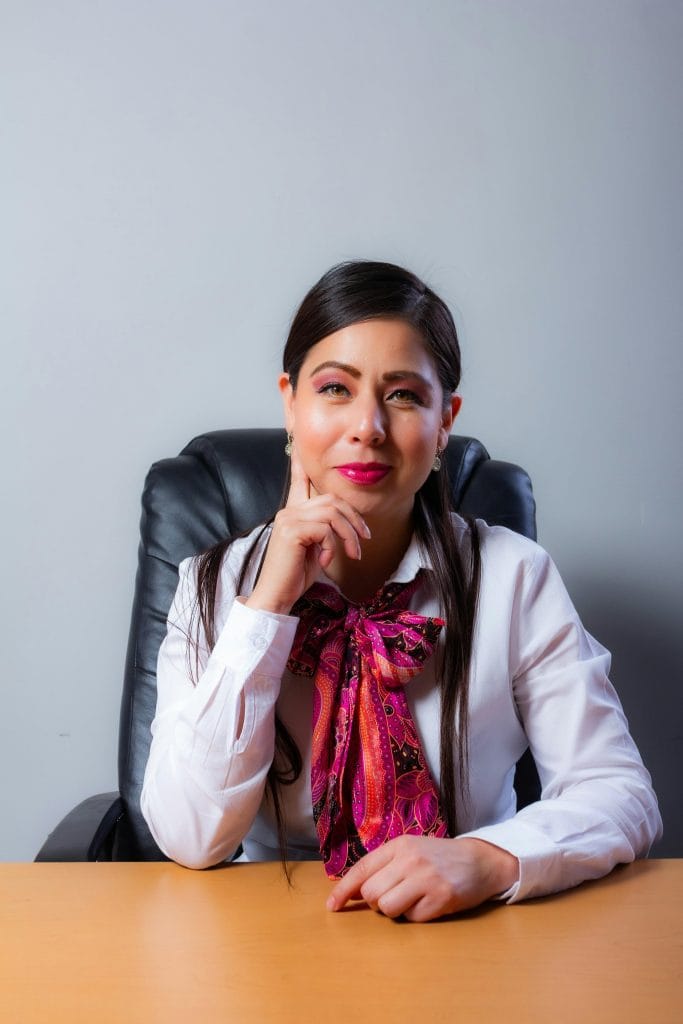 pexels photo 33438842 33438842 Portrait of a professional woman in an office setting, exuding confidence and poise.
